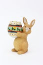 Easter rabbit with egg of clay