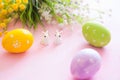 Easter rabbit with Easter eggs on wooden background. Close-up Royalty Free Stock Photo