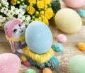Easter rabbit figurine with colorful eggs Royalty Free Stock Photo