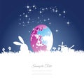 Easter rabbit moon colored egg blue white background Royalty Free Stock Photo