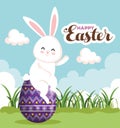 Easter rabbit sitting on egg decoration Royalty Free Stock Photo