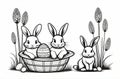 Easter rabbits in a basket surrounded by painted eggs and twigs of flowering willow. Royalty Free Stock Photo