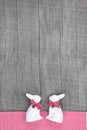 Easter rabbits decoration in interior on a wooden background in