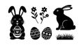 Easter rabbits holding decorated eggs with floral and grass elements vector illustration black silhouette Royalty Free Stock Photo