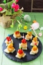 Easter recipe, festive appetizer. Canapes with pineapple, grill chicken, marinated peppers - on the festive table