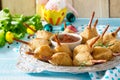 Easter recipe, festive appetizer. Meat in biscuits, deep fried served with ketchup sauce