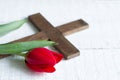 Easter red tulip and cross on white boards Royalty Free Stock Photo