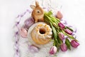 Easter ring cake with tulip and bunny decoration Royalty Free Stock Photo
