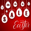 Easter sale banner. Easter hanging eggs, cartoon ribbon bow, red background. Tag template for holiday Easter decoration Royalty Free Stock Photo