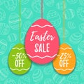 Easter sale offer, banner template. Colored eggs with lettering, isolated on blue seamless background. Easter paper eggs sale tags Royalty Free Stock Photo
