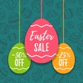 Easter sale offer, banner template. Colored eggs with lettering, isolated on blue seamless background. Easter paper eggs sale tags Royalty Free Stock Photo