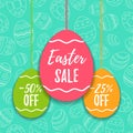 Easter sale offer, banner template. Colored eggs with lettering, isolated on blue seamless background. Easter paper eggs Royalty Free Stock Photo