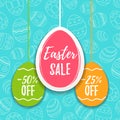 Easter sale offer, banner template. Colored eggs with lettering, isolated on blue seamless background. Easter paper eggs sale tags Royalty Free Stock Photo