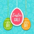 Easter sale offer, banner template. Colored eggs with lettering, isolated on blue seamless background. Easter paper eggs Royalty Free Stock Photo