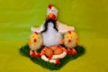 Easter scene with chicken with eggs and two chick
