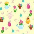 Easter seamless pattern rabbit and flowers tulips, chick, eggs and paw prints. Spring pattern for textiles.