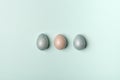 Easter, silver, blue eggs on a blue background