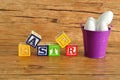 Easter spelled with colorful alphabet blocks Royalty Free Stock Photo