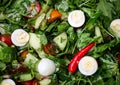 Easter Spring salad with quail eggs, tomatoes and cucumbers Royalty Free Stock Photo