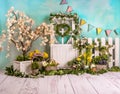 Easter spring sett up with colourful flowers yellow and light wood Royalty Free Stock Photo