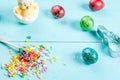 Easter ] with sprinkles, cookie cutter & eggs Royalty Free Stock Photo