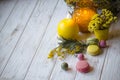 Easter still life with candles on the white board Royalty Free Stock Photo