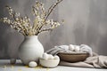 Easter still life with eggs and willow branches on a gray background