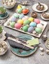 Easter still life table place setting decoration colored eggs Royalty Free Stock Photo