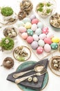 Easter still life. table place setting decoration colored eggs Royalty Free Stock Photo
