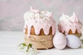 Easter still life. Traditional pastries, painted eggs and white cherry flowers Royalty Free Stock Photo