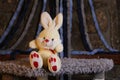 Easter stuffed baby bunny with beige, red and white coloring