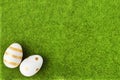 Easter sunday brunch concept, gold eggs on green grass, holiday background with copy space Royalty Free Stock Photo