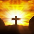 Easter Sunday, the cross of the crucifixion of Jesus Christ, the concept of the Christian faith. The tomb is empty with Royalty Free Stock Photo