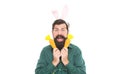 Easter surprises. cheerful guy holding carrots. spring holiday greeting. eastertide. surprised man Royalty Free Stock Photo