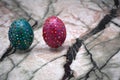 Easter symbol in green color near eggs with beads. Happy holiday concept. Easter decor: basket with collection of painted and deco Royalty Free Stock Photo