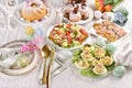 Easter table with appetizers and sweet pastries Royalty Free Stock Photo