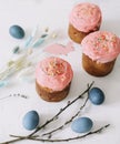 Easter table with Easter cakes, painted eggs and tree branches. Kulich decorated with icing.  Happy Easter concept Royalty Free Stock Photo