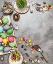 Easter table decoration with colored eggs and sweets Royalty Free Stock Photo