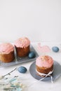 Easter table with Easter cakes, painted eggs and tree branches. Kulich decorated with icing.  Happy Easter concept Royalty Free Stock Photo