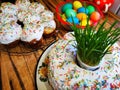 Easter table: pasch eggs, several kulichi and paschal cake