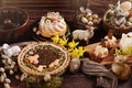 Easter table in rustic style with traditional pastries and decors Royalty Free Stock Photo