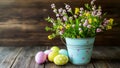An Easter table scene with a container of multicolored eggs and seasonal flowers, framed by a bright, out-of-focus Royalty Free Stock Photo