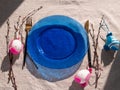 Easter table setting empty blue glass plate cutlery tree branches linen cloth flat lay harsh shadow Festive dish place Royalty Free Stock Photo