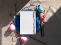 Easter table setting empty blue glass plate cutlery tree branches linen cloth flat lay harsh shadow Festive dish place Royalty Free Stock Photo