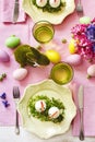 Easter table setting. Funny chickens from eggs served on the Easter table. Royalty Free Stock Photo