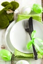 Easter table setting with grass bunny decoration Royalty Free Stock Photo