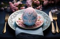 easter table setting with paper napkin and egg, pink and blue Royalty Free Stock Photo