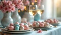 Easter table setting with pastel eggs and pink flowers. Two glasses of white wine sit on a light blue tablecloth with decorative Royalty Free Stock Photo