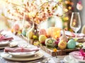 Easter table setting, springtime party table decor with flowers, eggs and beautiful details, spring festive home party Royalty Free Stock Photo