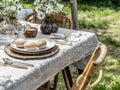 Easter table setting, springtime party table decor with flowers, eggs and beautiful details, spring festive home party Royalty Free Stock Photo